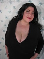 Sexy latina with large breasts in black