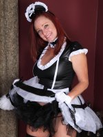Shelly Jones	Busty redheaded Shelly Jones from AllOver30 playing maid and spreading