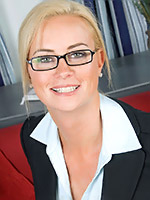 Blonde business woman toying